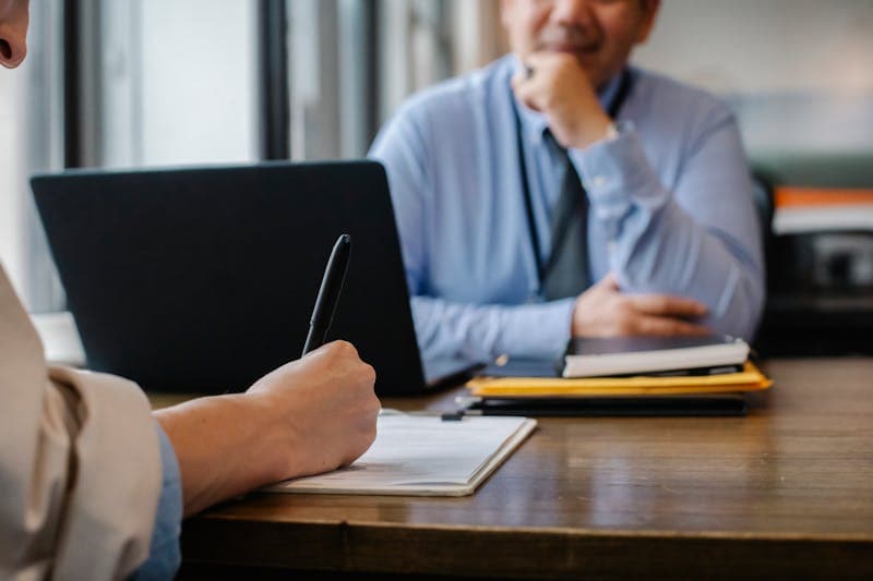Person scanning document with smartphone