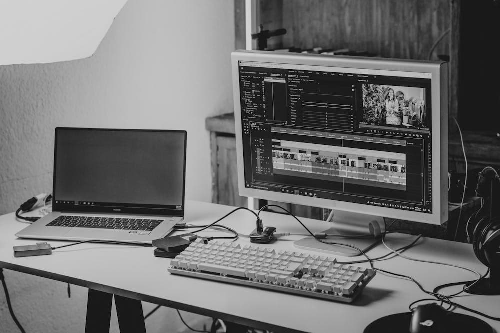 Web developer optimizing images on laptop screen