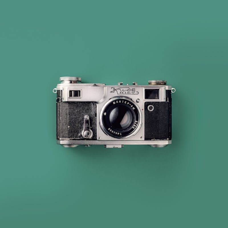 Photographer editing images on desktop computer