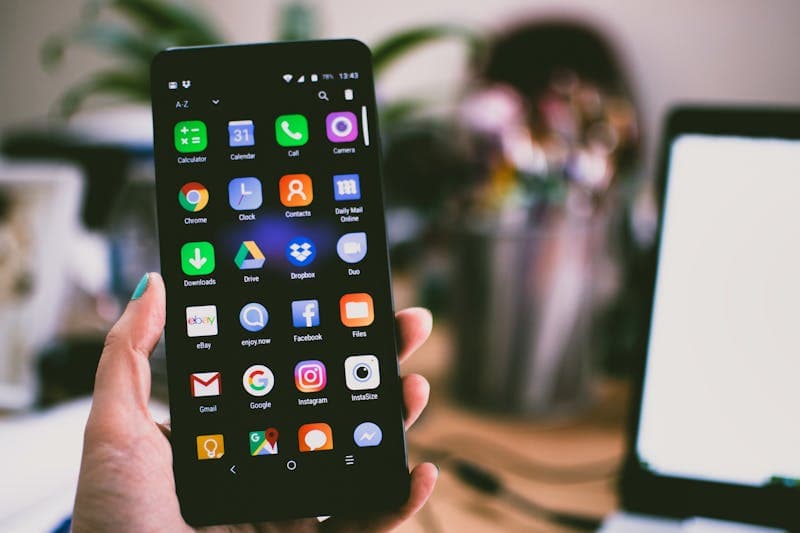 Smartphone showing Instagram feed with polished photos