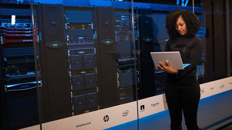 Developer workspace with data transformation tools on multiple screens