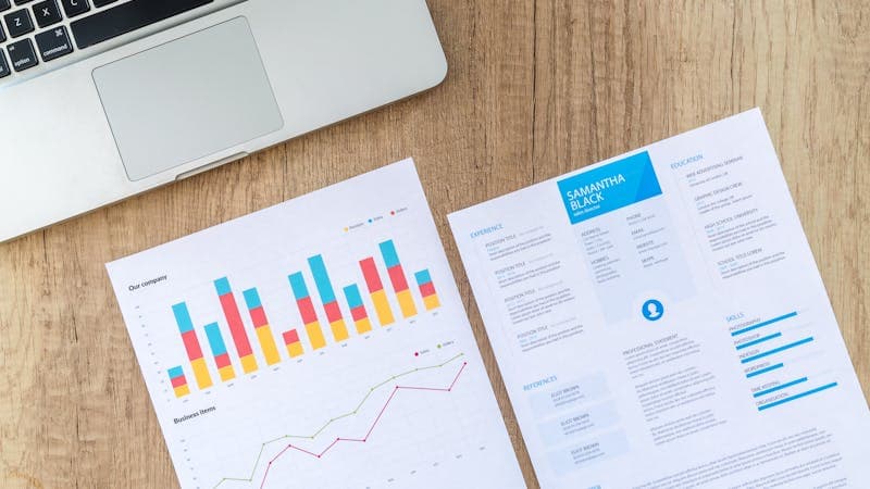 Design software showing letterhead layout with brand colors and logo placement