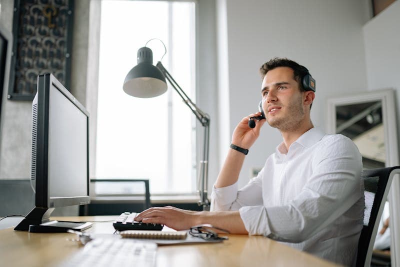 Small business owner reviewing customer feedback at a desk