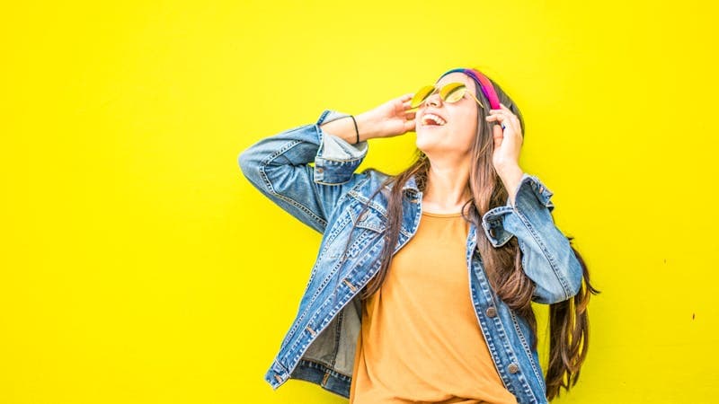 Smartphone showing AI-generated outfit suggestions with color palettes