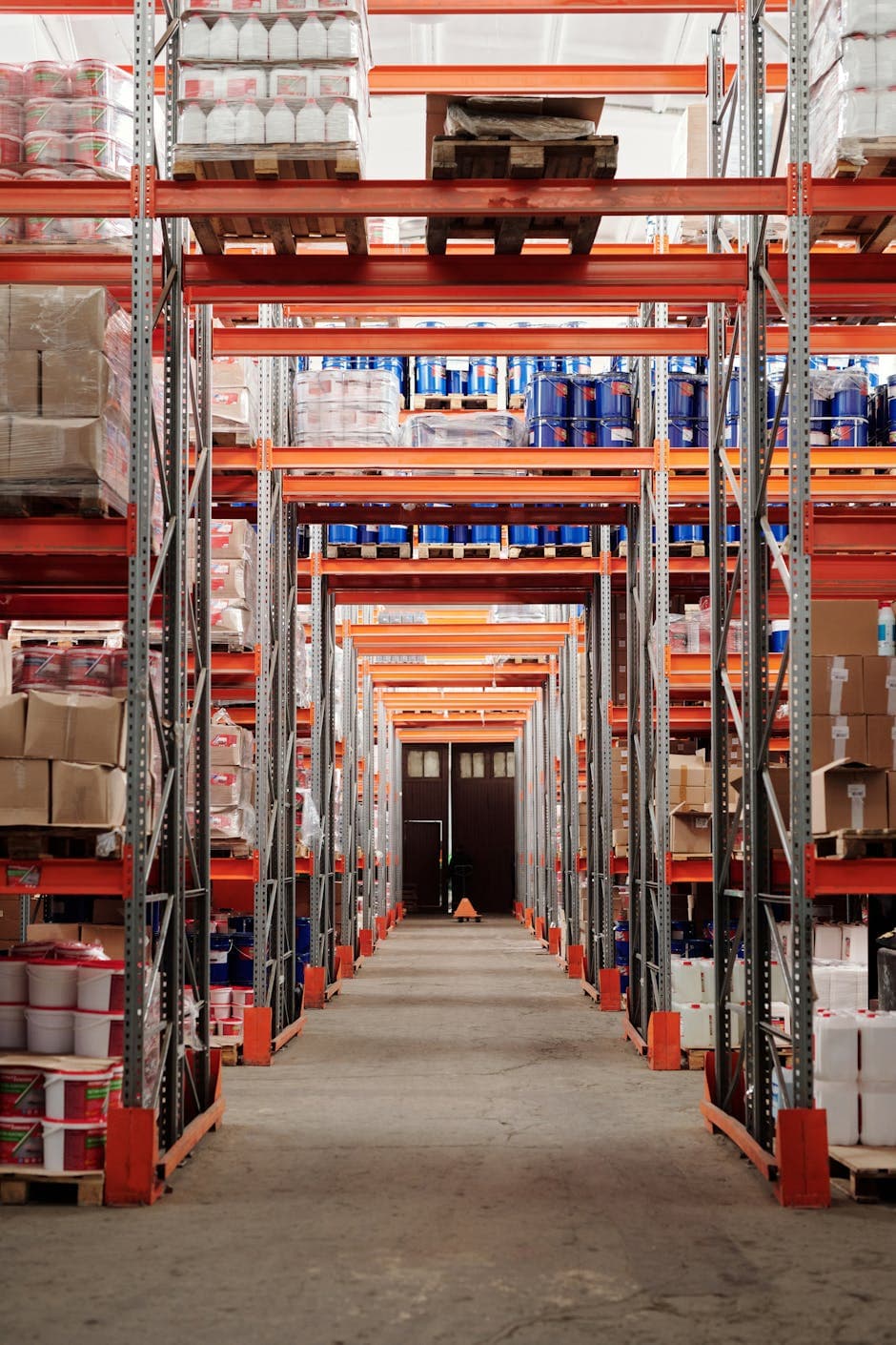 Warehouse worker scanning barcodes on packages