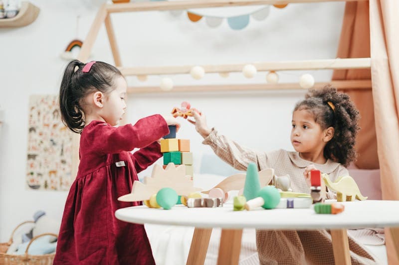 Pediatrician measuring child height on growth chart