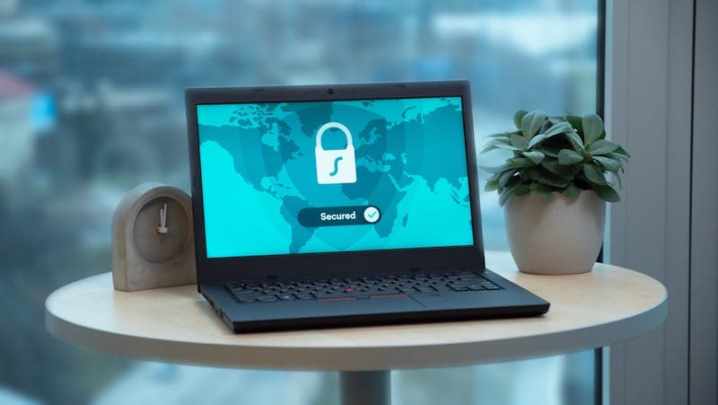 Cookie consent banner on a laptop screen showing accept and reject options
