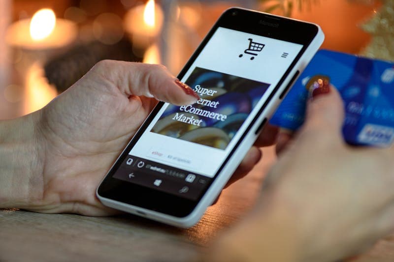 Close-up of credit card numbers on plastic card