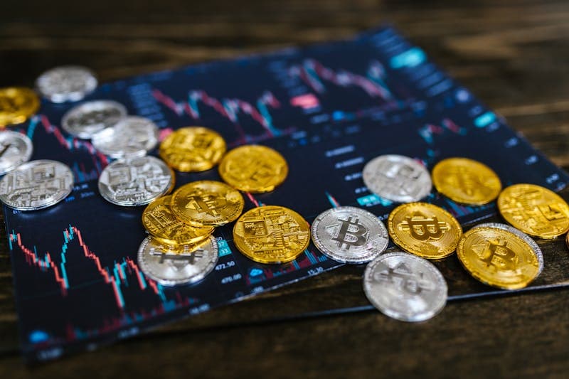 Bitcoin and Ethereum coins on financial chart
