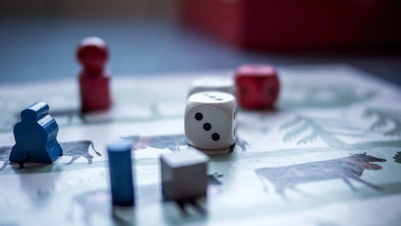 Colorful polyhedral dice on a game table
