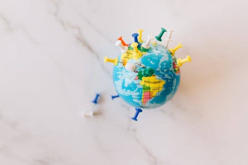 World map with network connection points highlighted
