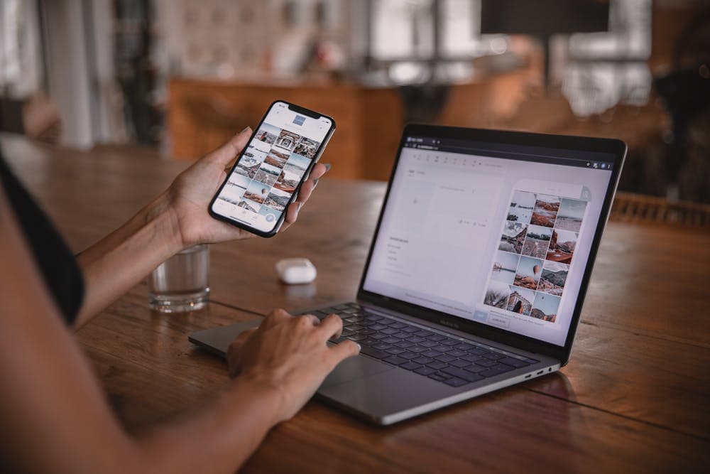 Social media apps on phone screen with photo gallery